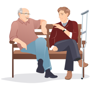 Two older men talking on a couch.