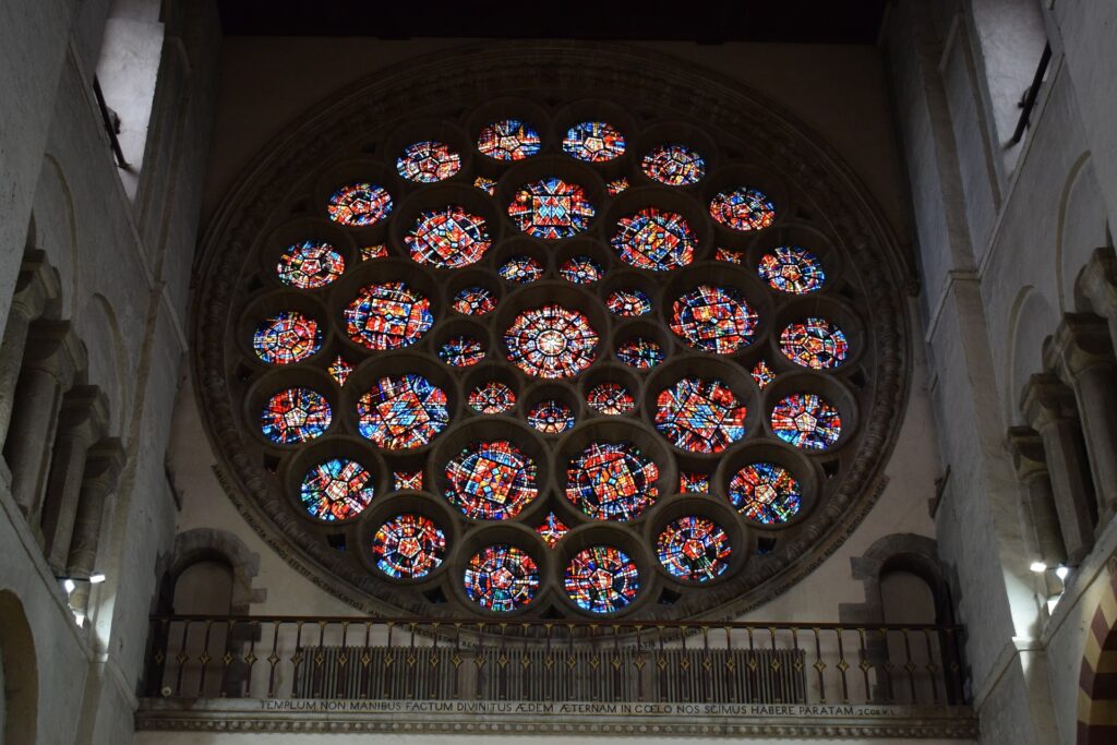 A large stained glass window in a church.